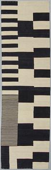 A runner, an Oriental kilim, ca 283 x 80,5-83 cm.