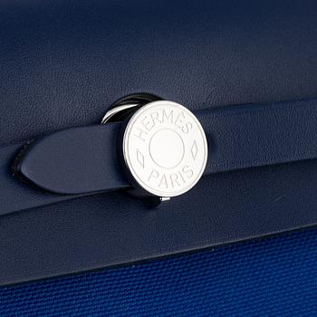Hermès, a 'Herbag Zip 31' handbag in Bleu Saphir Hunter leather and Bleu Billard military canvas, 2021.