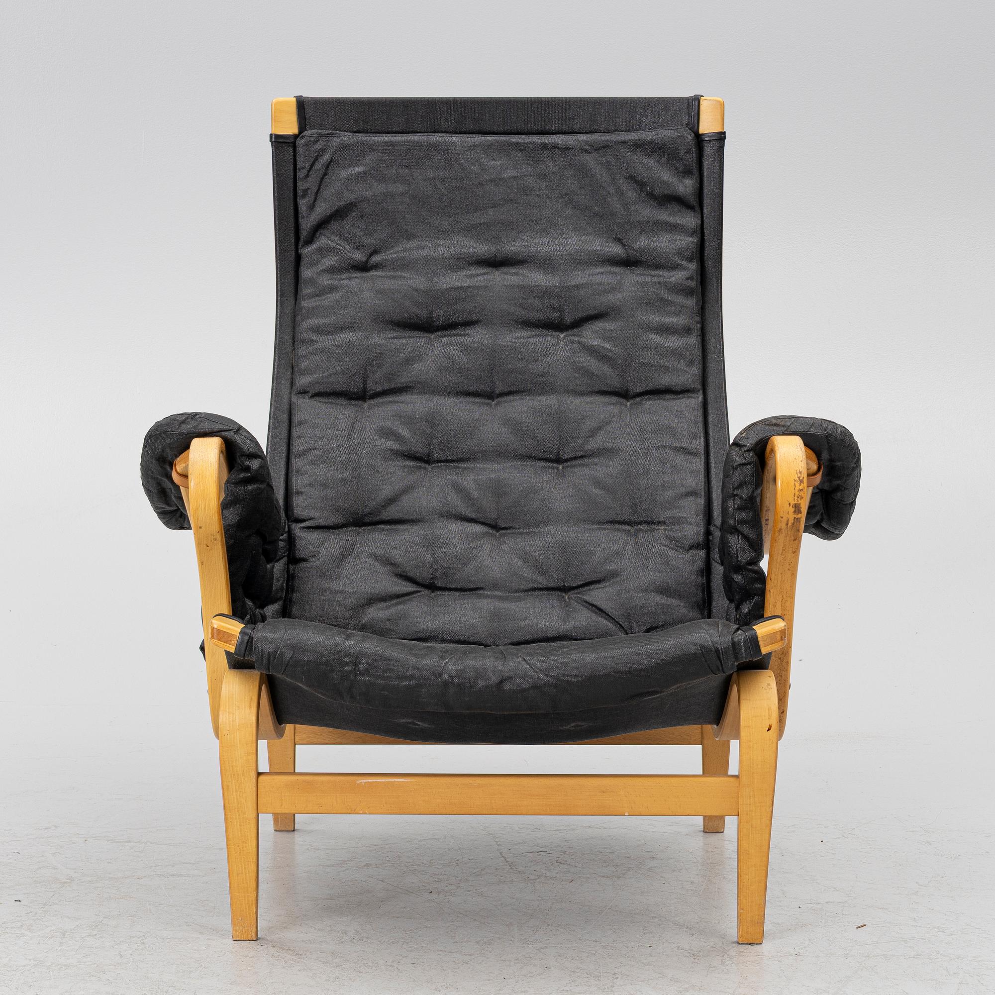 Bruno Mathsson, a 'Pernilla' armchair, Dux, Sweden, later part of the 20th century.