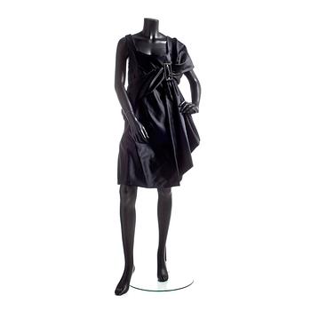 614. CHRISTIAN LACROIX, a black cocktail dress.