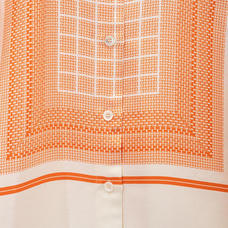 Céline, a silk and wool blouse, size 34.