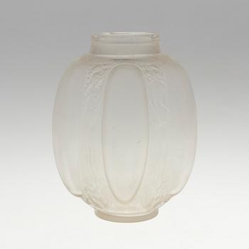 A René Lalique 'Six figurines et masques' moulded glass vase, France 1920-30's.