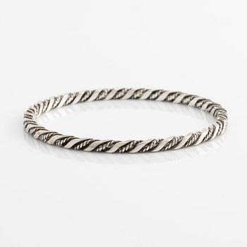 A Georg Jensen bangle in sterling silver.