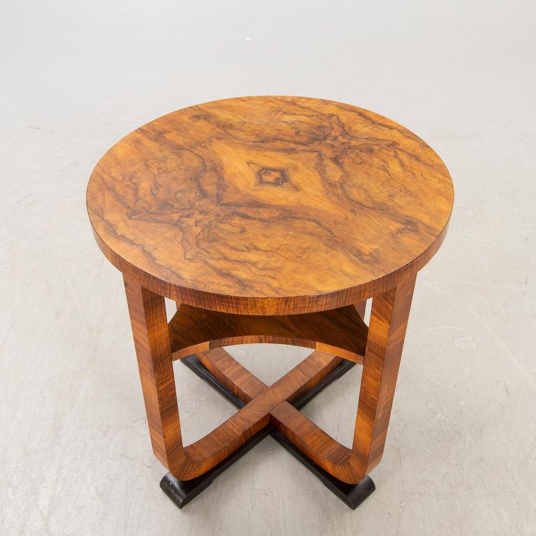 An Art Deco 1930/40s walnut table.
