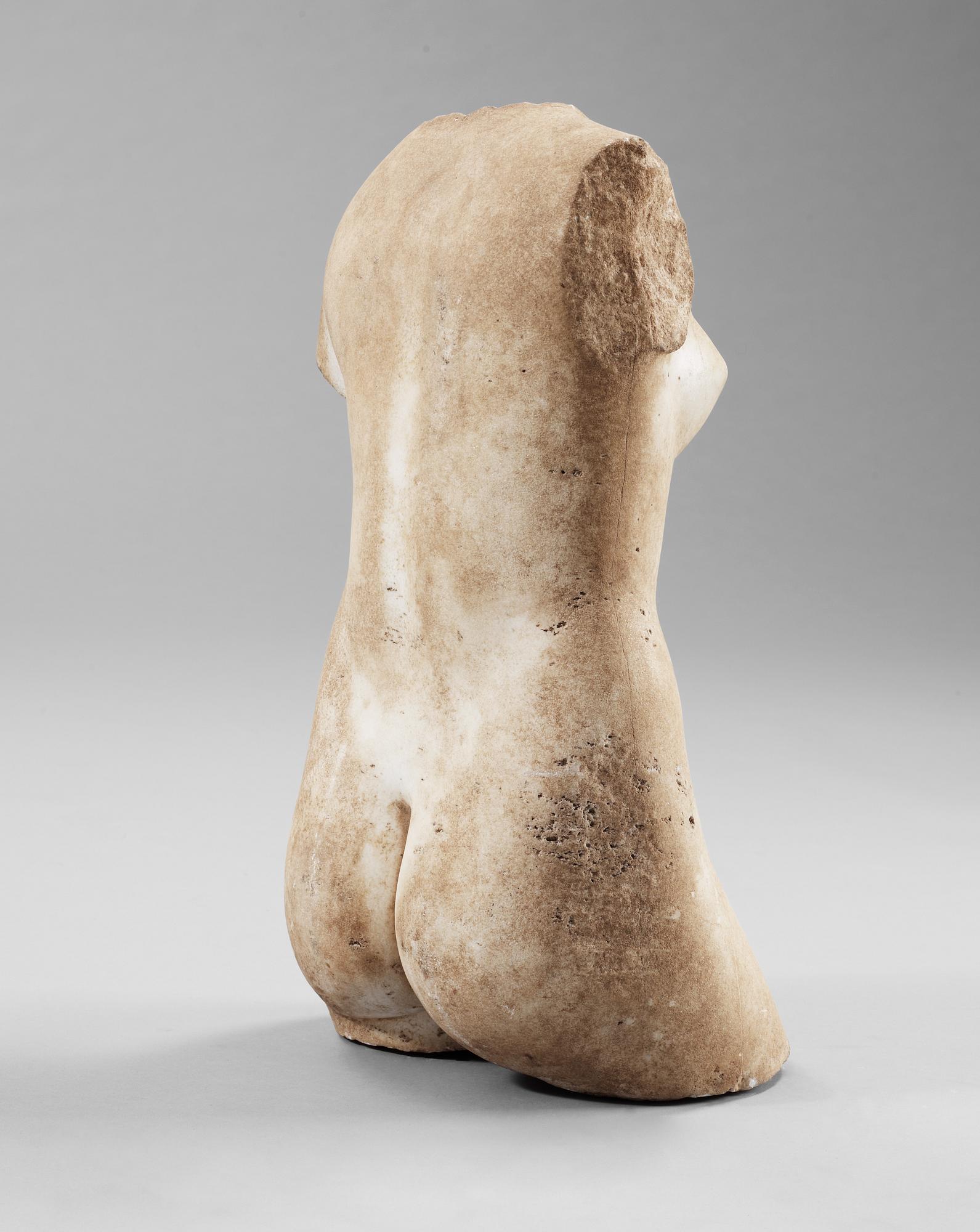 A torso, after the Antique, representing Aphrodite Anadyomene. Probably 19/20th Century.