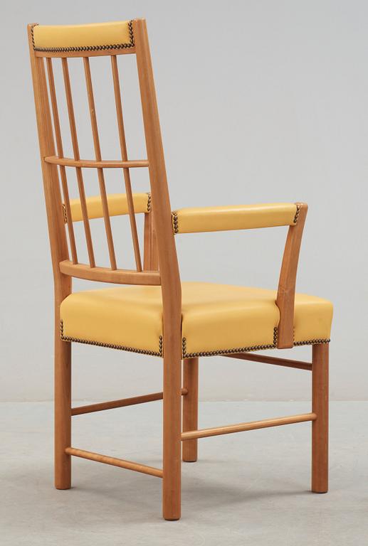 A Josef Frank cherry and yellow leather armchair, Svenskt Tenn, model 652.