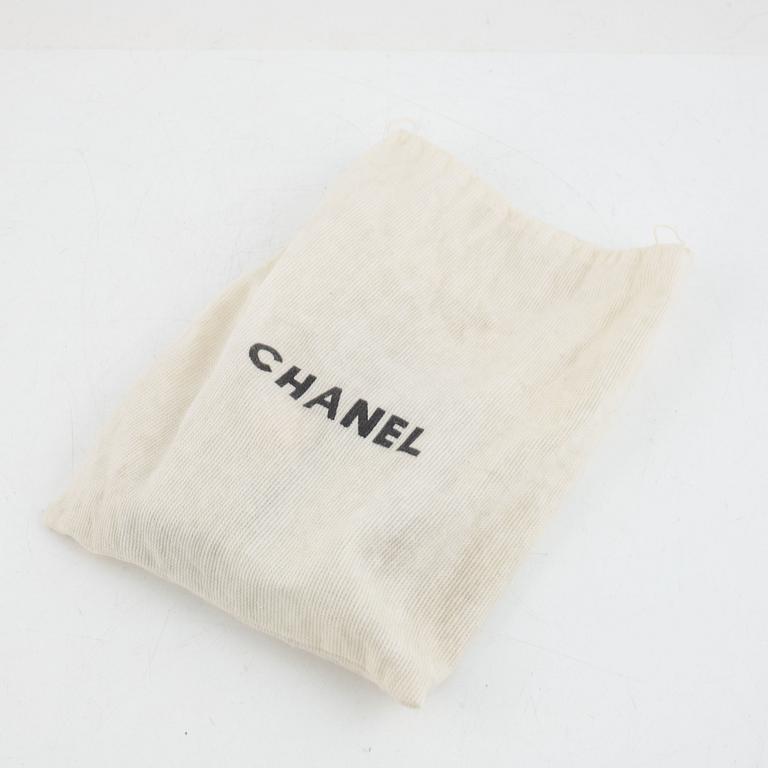 Chanel, micro flap bag, 1989-1991.
