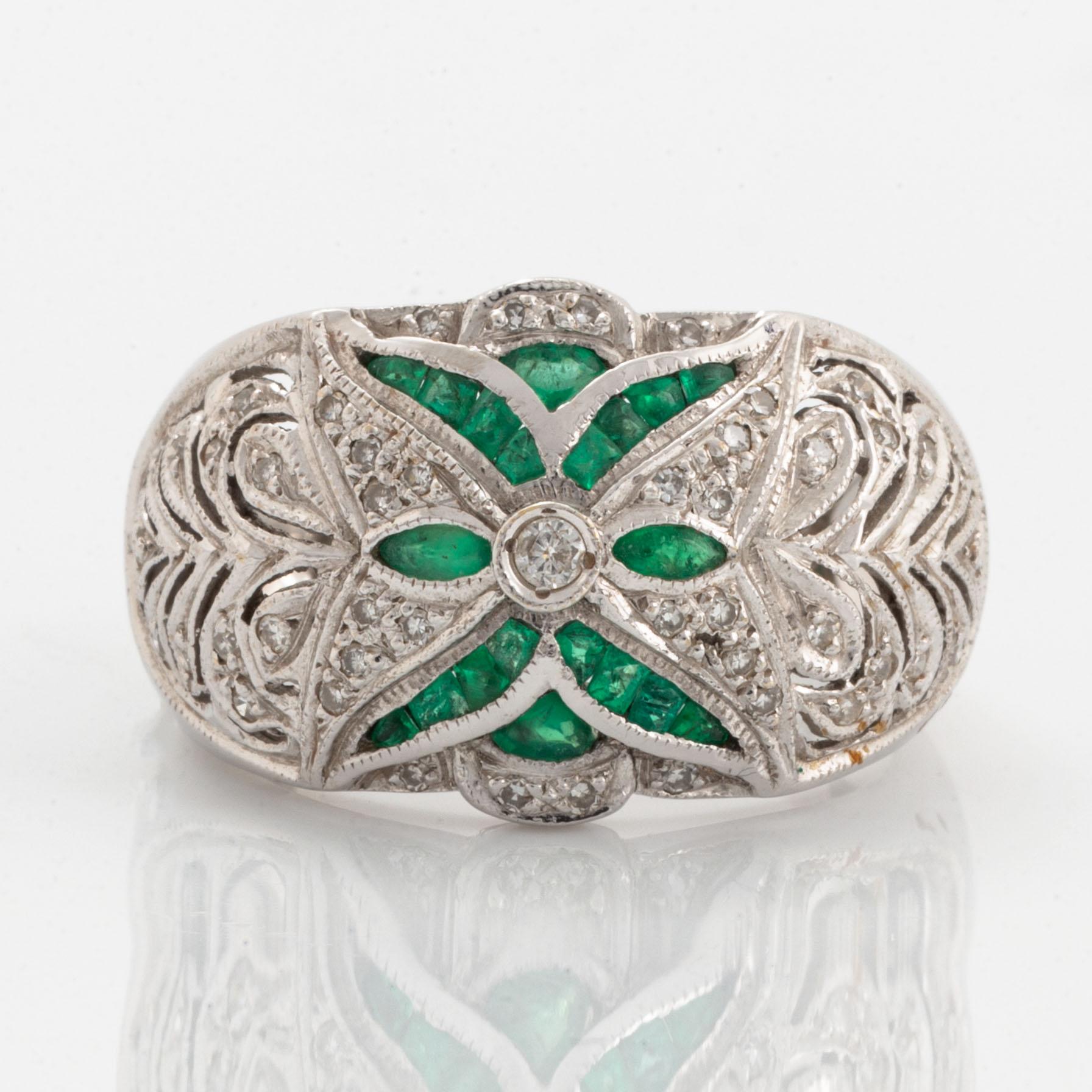 Eight-cut diamond and emerald ring.