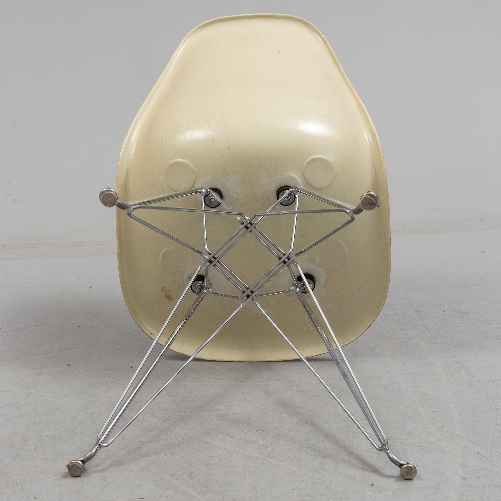 A 'DSR' chair and three loose seat  by Charles & Ray Eames for Vitra, 1960s/70s.