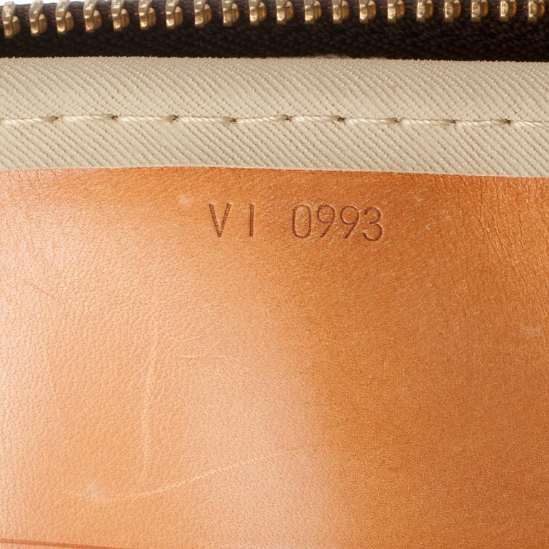 LOUIS VUITTON, a monogram canvas bag / garment cover.