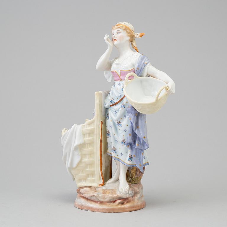 A German porcelain figurine, early 20th century.