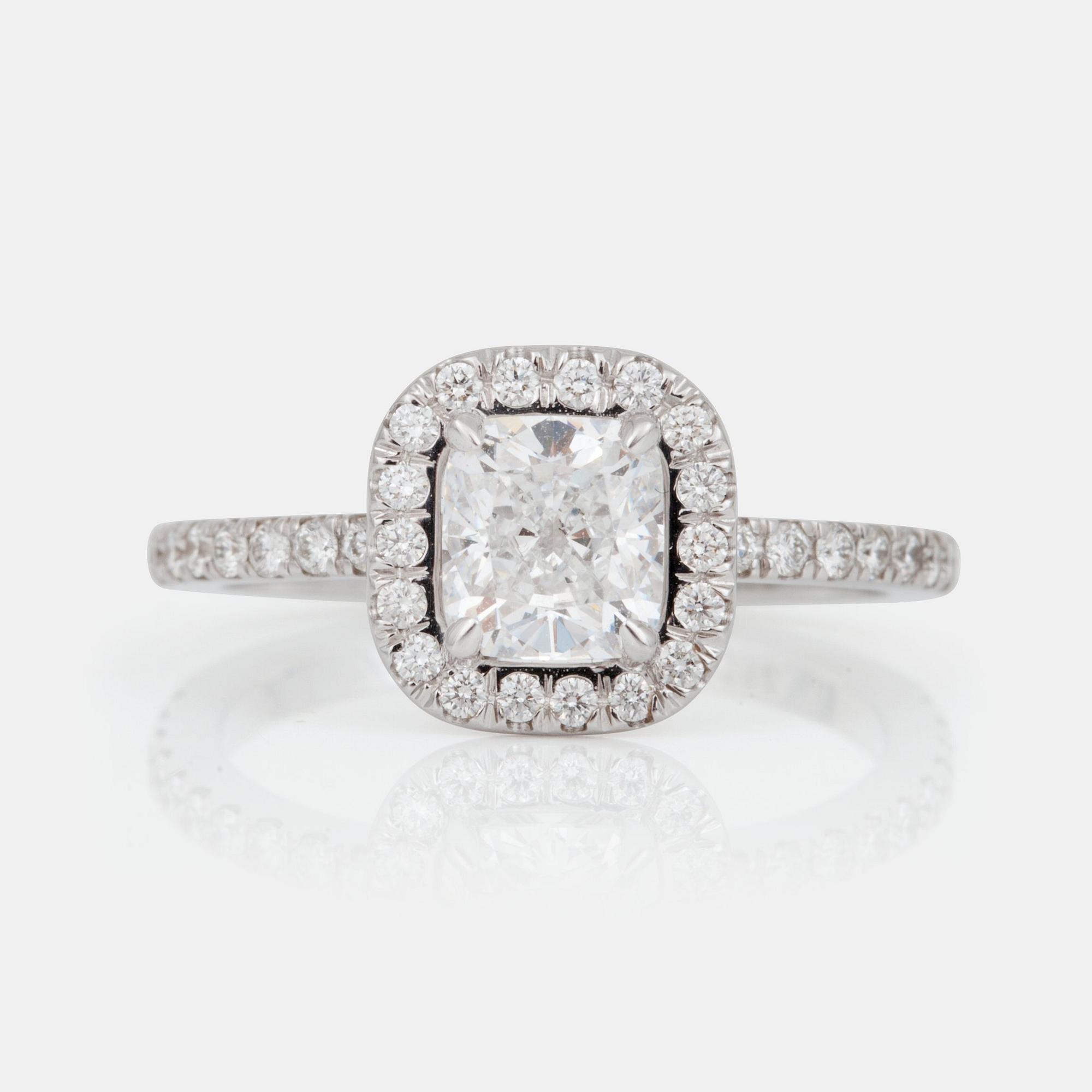 A cushion-cut 1.04 cts D/IF according to GIA cert, pavé set diamonds 0.45 ct in total, ring.