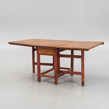 A 19th century gateleg table.
