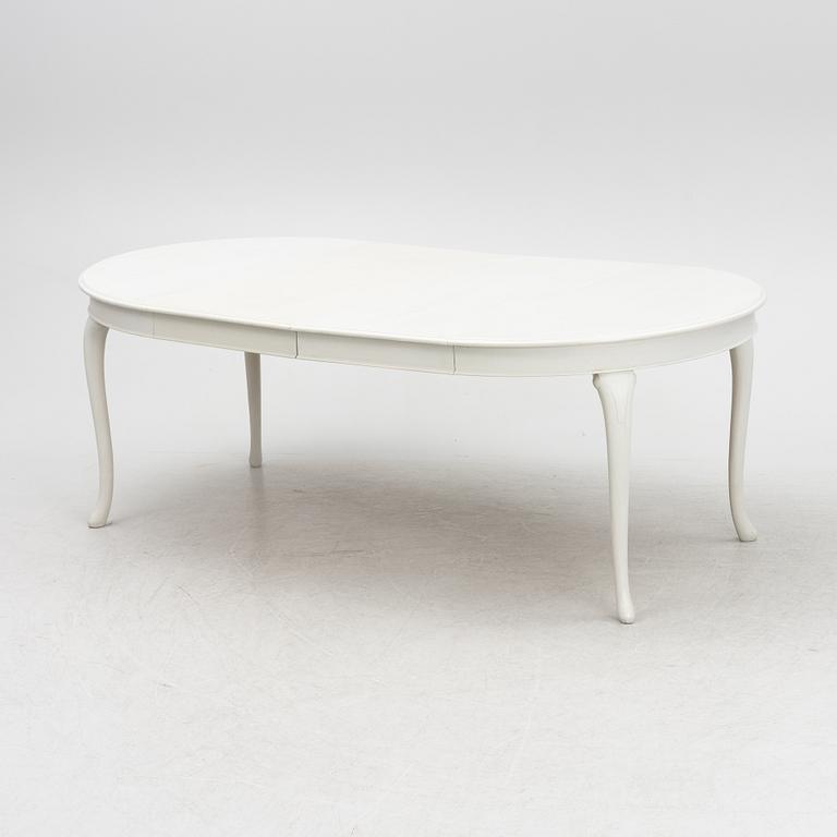 A Rococo style dining table, late 20th century.