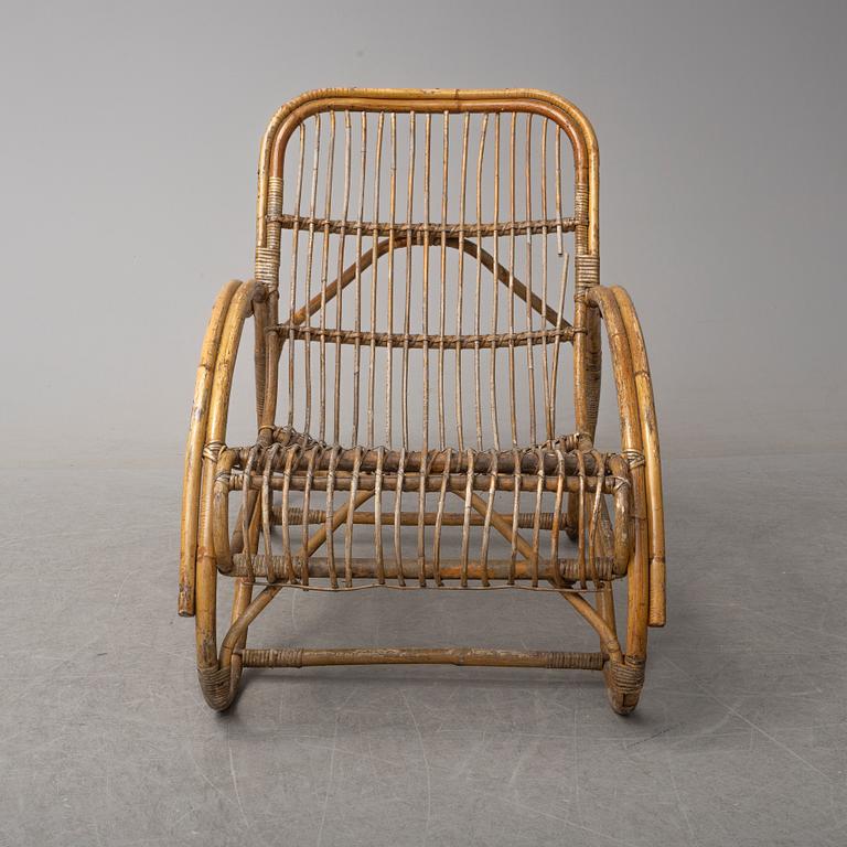 a pair of rattan easy chairs, 20th century.