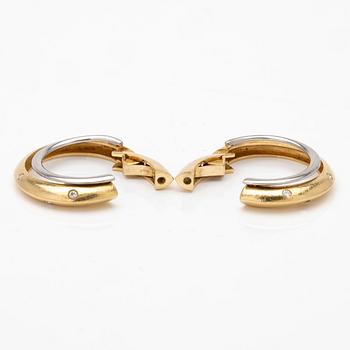 Ole Lynggaard, 18K gold and diamond hoop earrings.