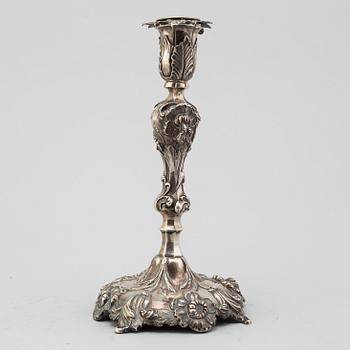 GUSTAF MÖLLENBORG, a silver candlestick dated 1853.