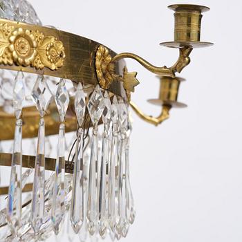 A Swedish late Empire gilt brass nine-light chandelier, 1830's.