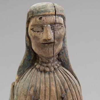 A wooden 19th century sculpture.