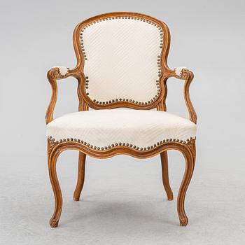 A French Louis XV oåpen back armchair, mid 18th century.