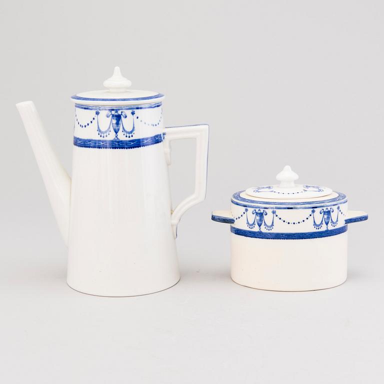 An English late 19th Century 70-piece 'Deva' dinnerware set from Minton, Stoke-on-Trent.