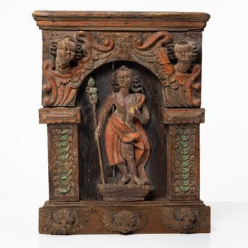 A religious carved wooden panel, 18th century.