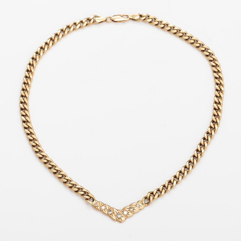 A 14K gold necklace with diamonds ca. 0.46 ct in total. With certificate.
