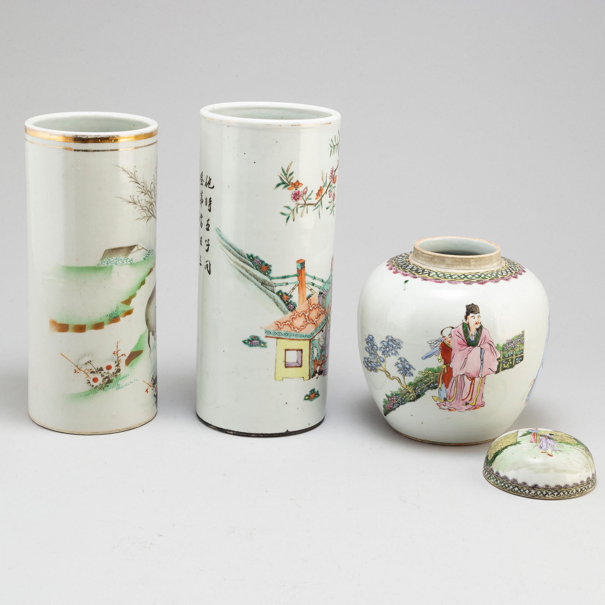 Two Chinese famille rose hat stands and a jar with cover, 20th century.