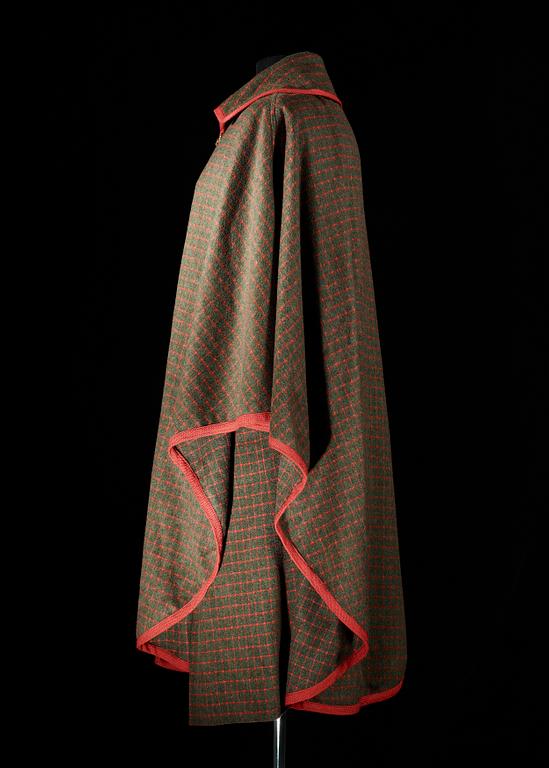 A wool cape and divided skirt by Celine.