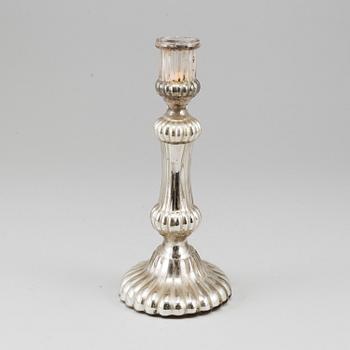 A 19th century glass candlestick.