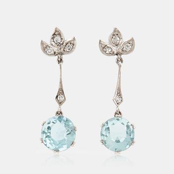 818. A pair of 18K white gold earrings set with faceted aquamarines and eight-cut diamonds.