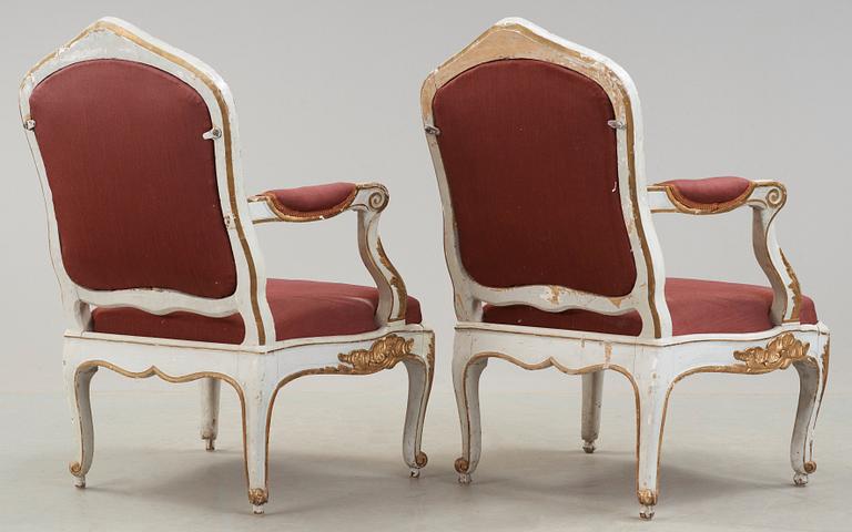 A pair of Rococo 18th century armchairs.