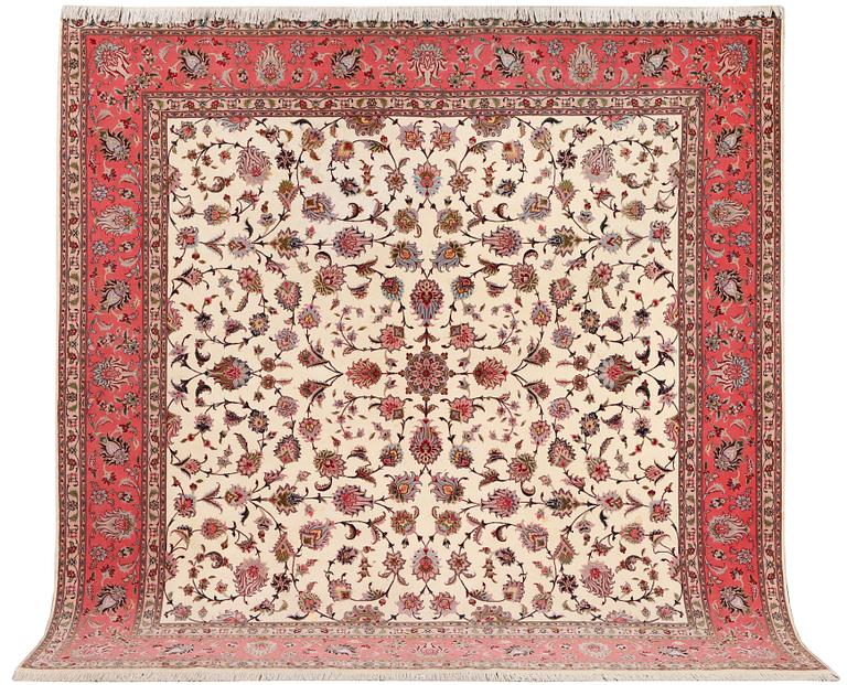 An old Tabriz carpet, part silk, 60 raj, c. 253 x 250 cm.