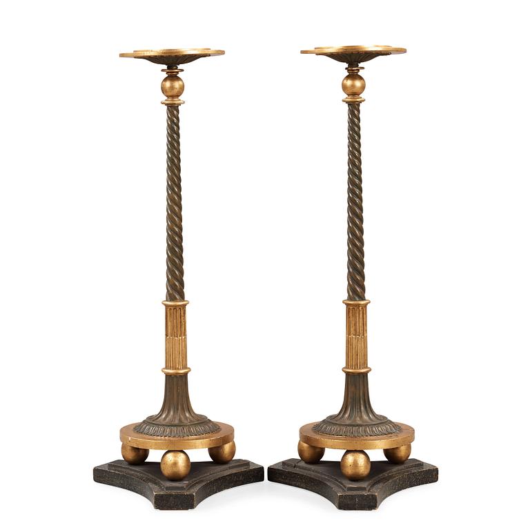 A pair of late Gustavian early 19th century candle stands.