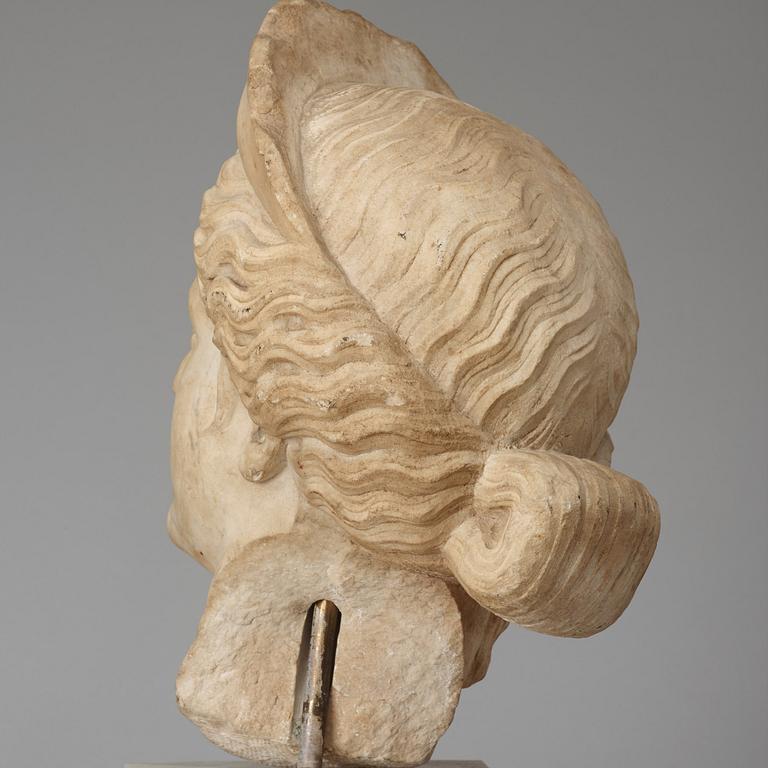 A marble portrait head of a woman with diadem, Roman 150 AD or later ie until modern times.