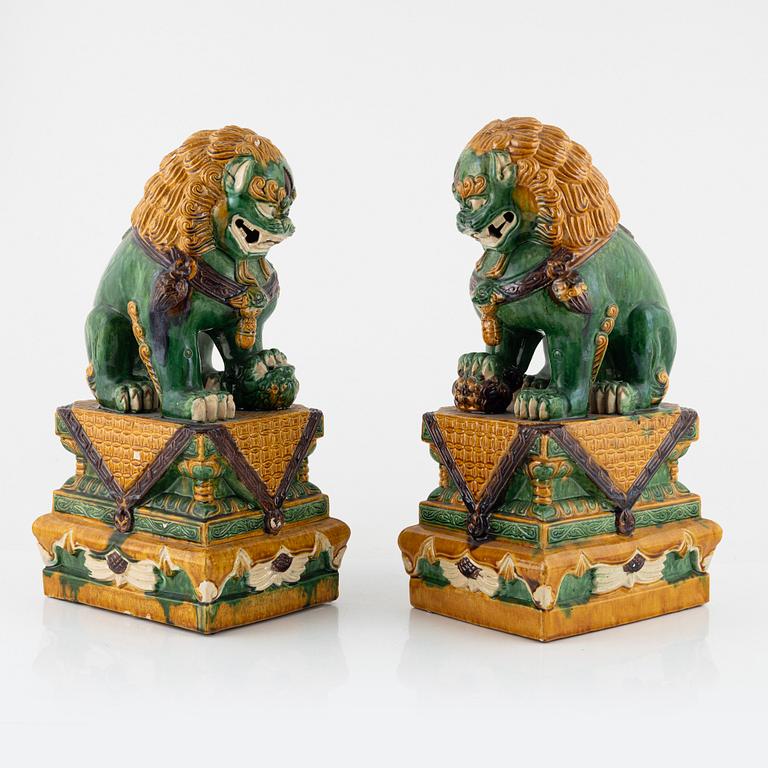 A pair of large figures of buddhist lions, China, second half of the 20th Century.