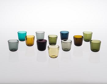 A set of 32 glasses and a pitcher in pressed glass, Nuutajärvi Finland.