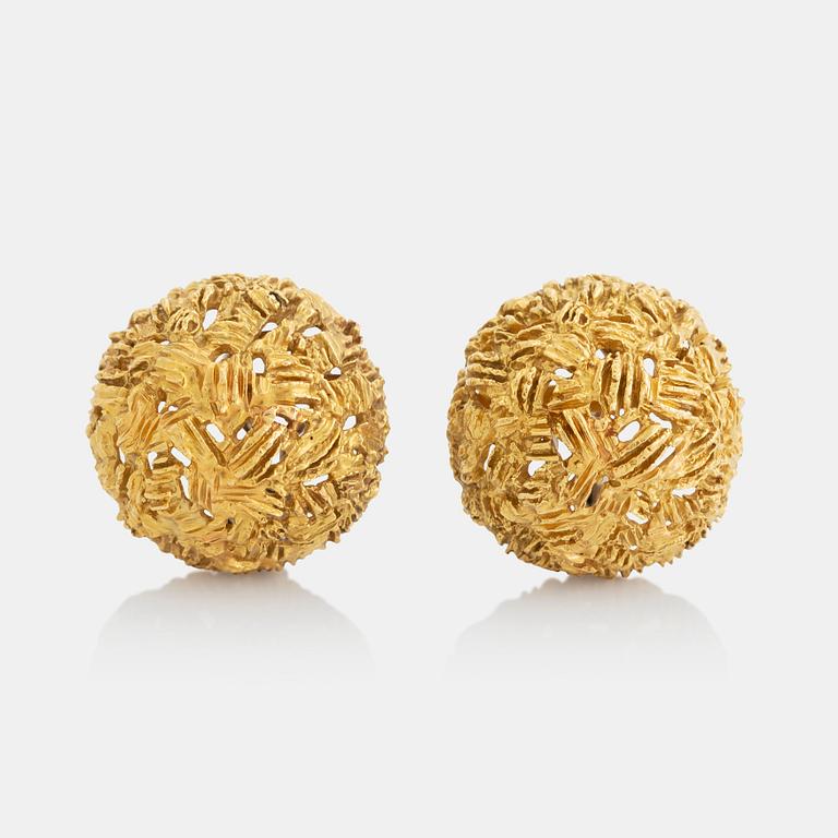 A pair of 18K gold earrings.