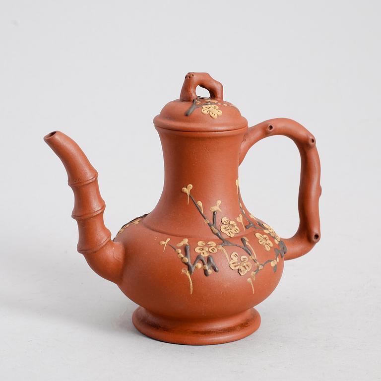 TEKANNA, lergods, Kina, 1900-tal.