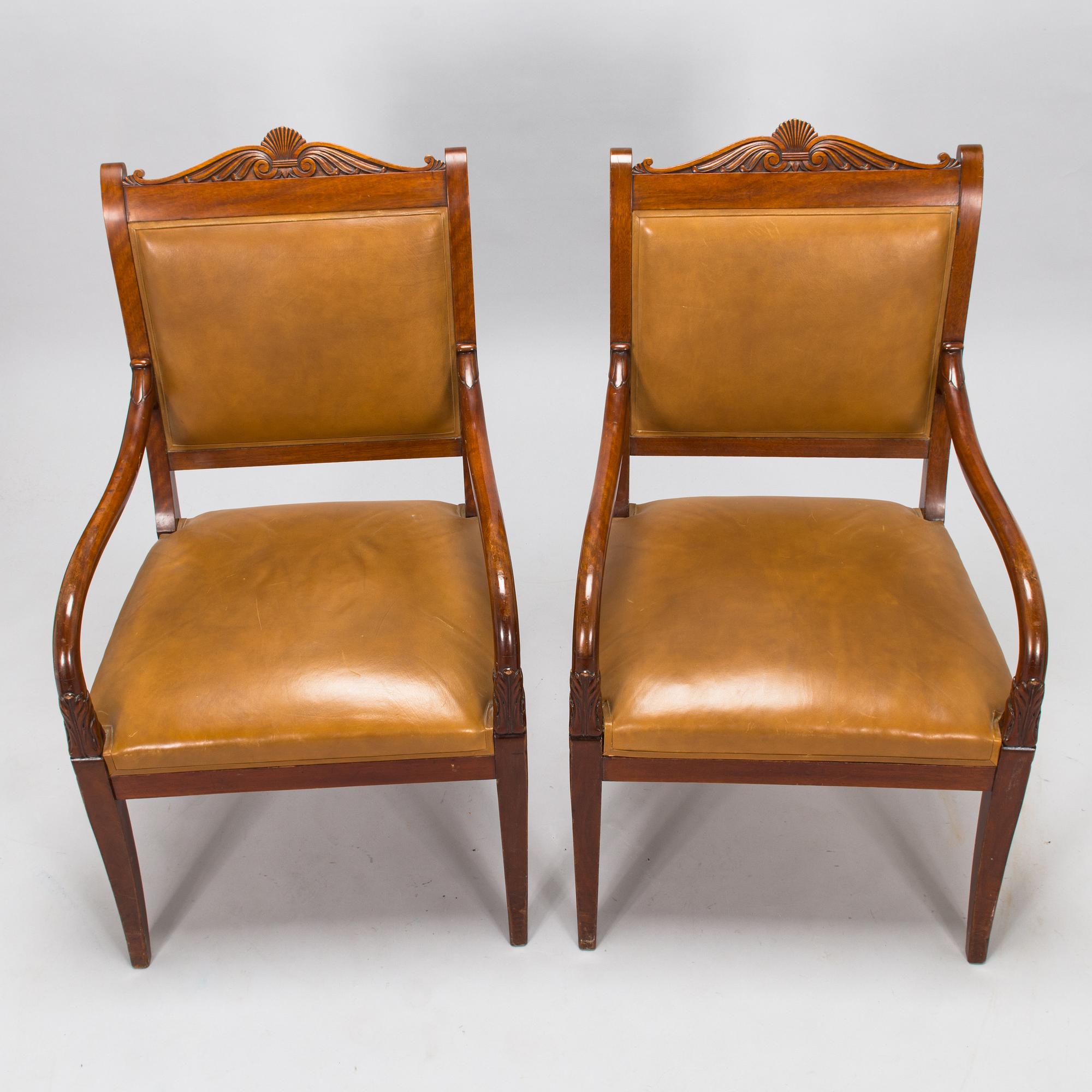 A pair of armchairs, possibly Boman, around 1900.