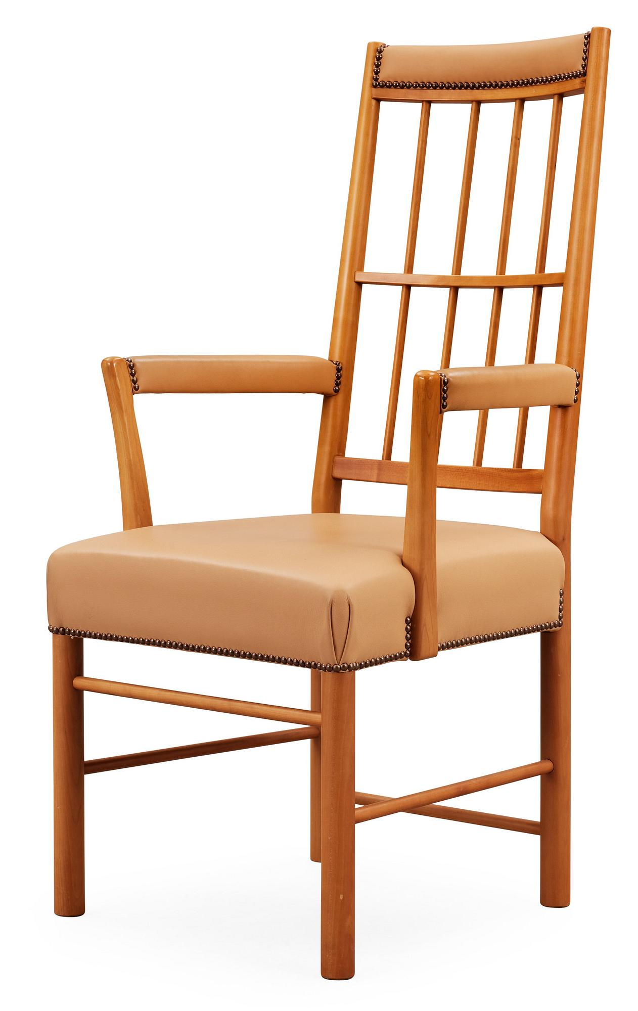 A Josef Frank cherry and beige leather armchair, Svenskt Tenn 2007, model 652.