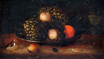 Still life with fruits, a bird, snail and a glass goblet.