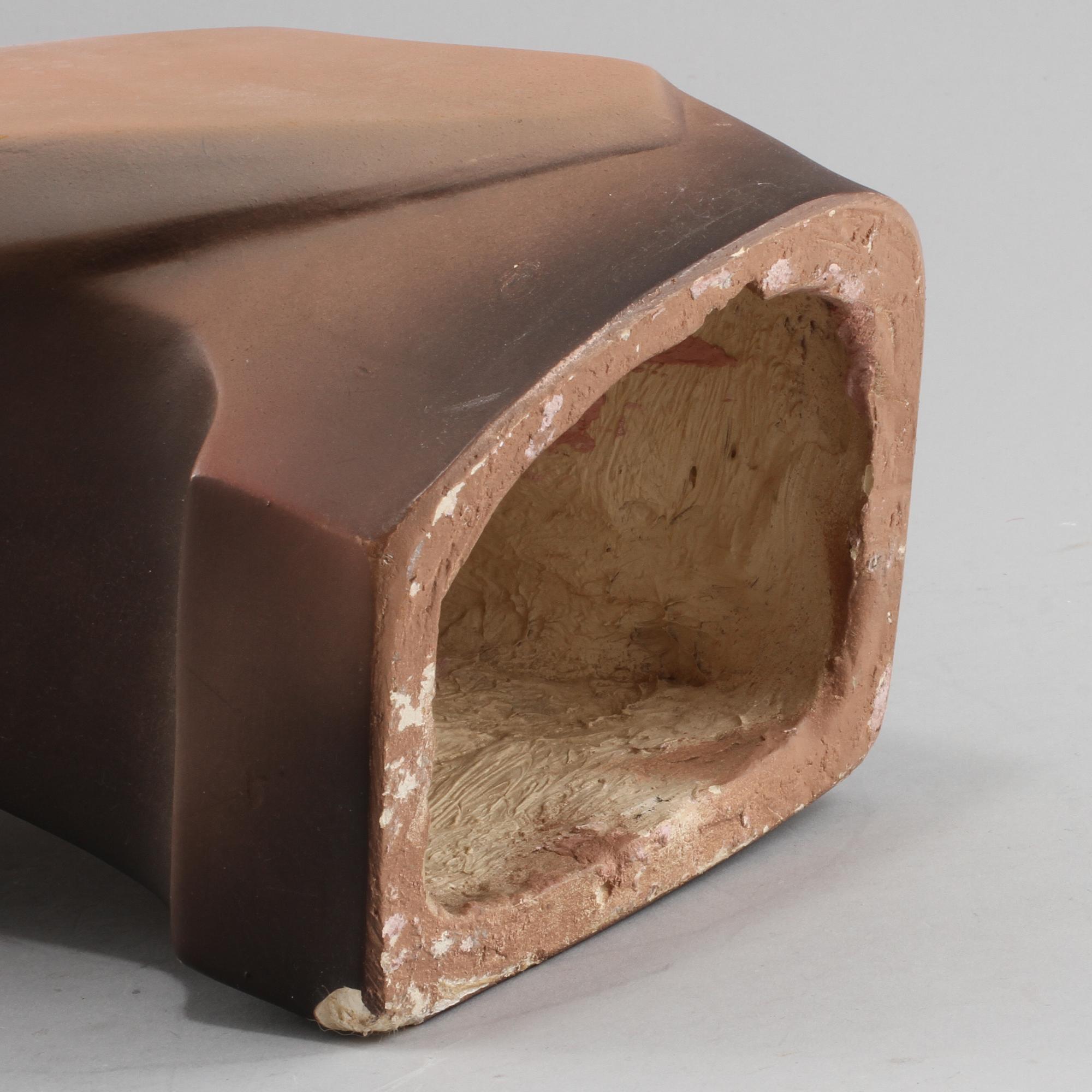 SKYLTDOCKA, gjutmassa, omkring 1900-talets mitt.