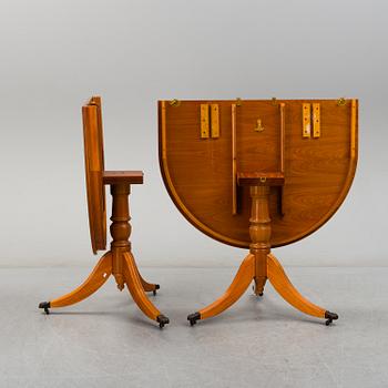 A late 20th century English style dining table and six chairs.