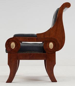 A Swedish Empire 1820/30's armchair.