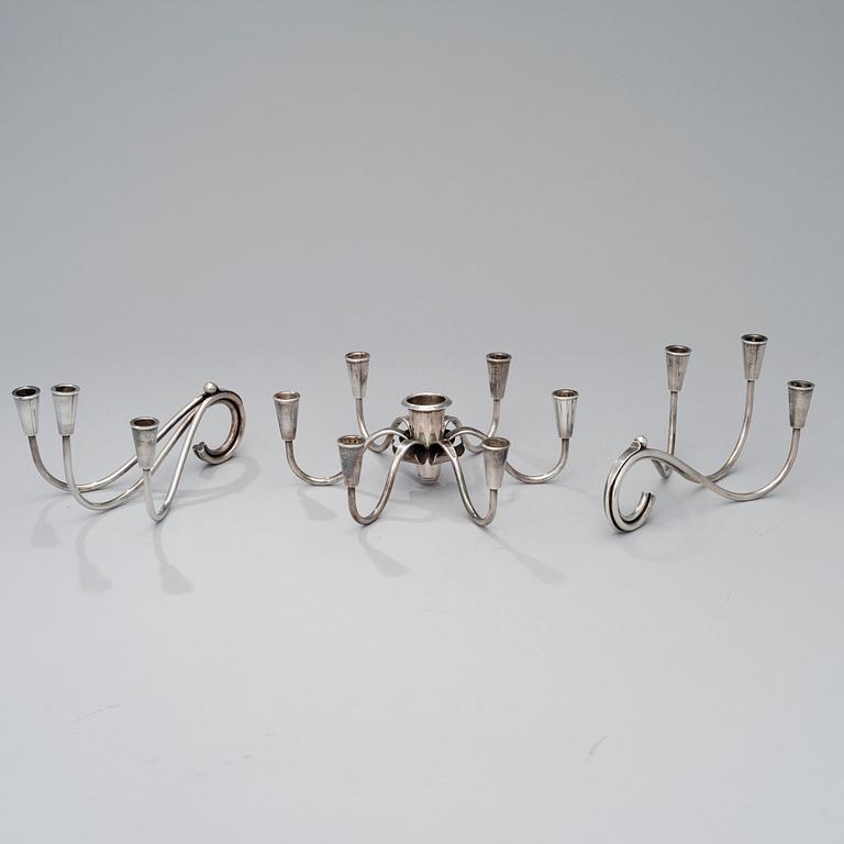 A pair of silver plated candelabra and a candelabrum, FDG, Denmark, mid 20th century.