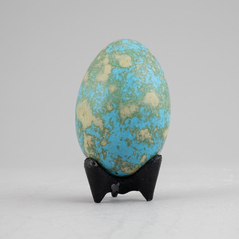 Hans Hedberg, a signed faiance egg with stand, Biot, France.