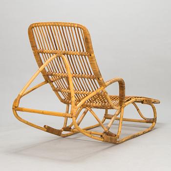 A rattan lounger, mid-20th century.