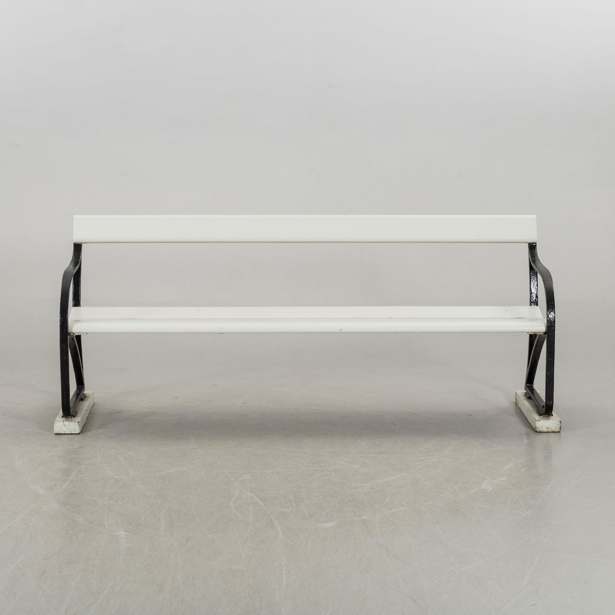 A cast iron garden sofa ends by Folke Bensow, Näfveqvarns Bruk, early 20th century.