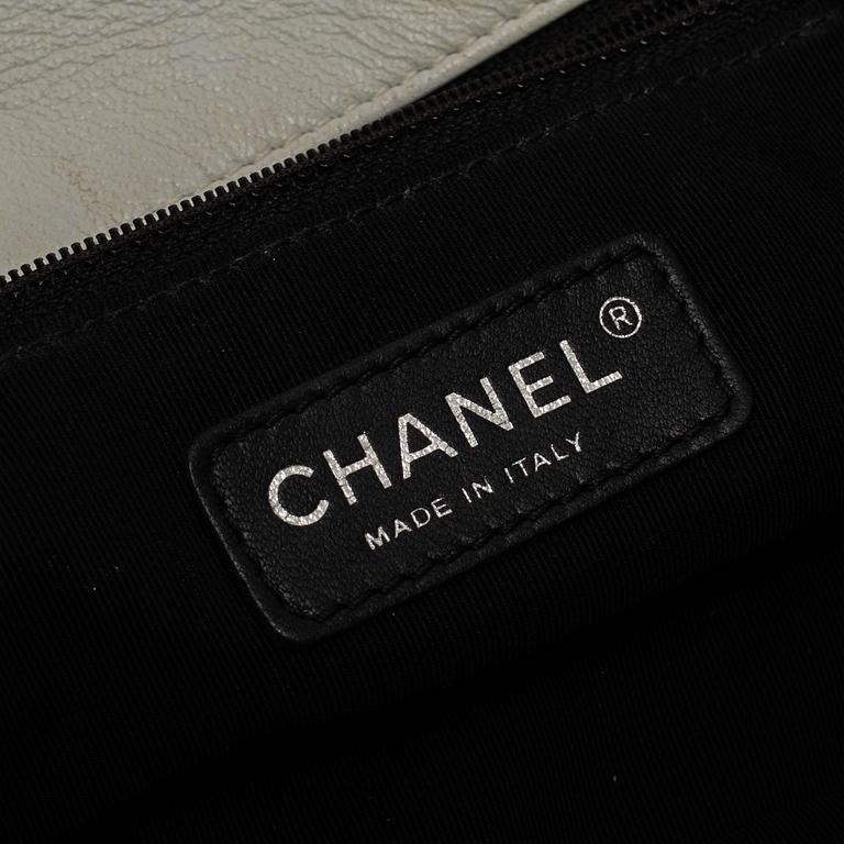 A white Chanel bag, 2010-2011.